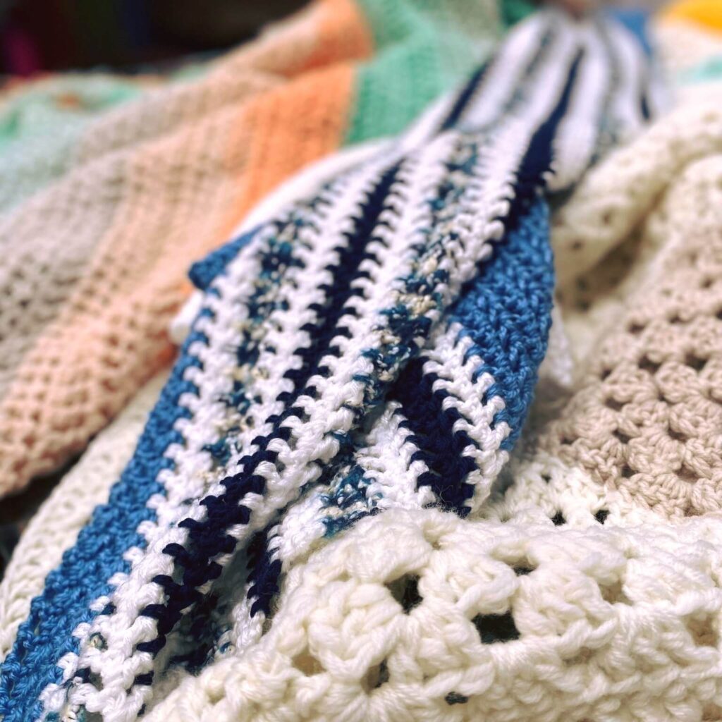 Detail of beautiful crocheted blankets for the TOTS Blanket Challenge at The Creative Fringe Penrith